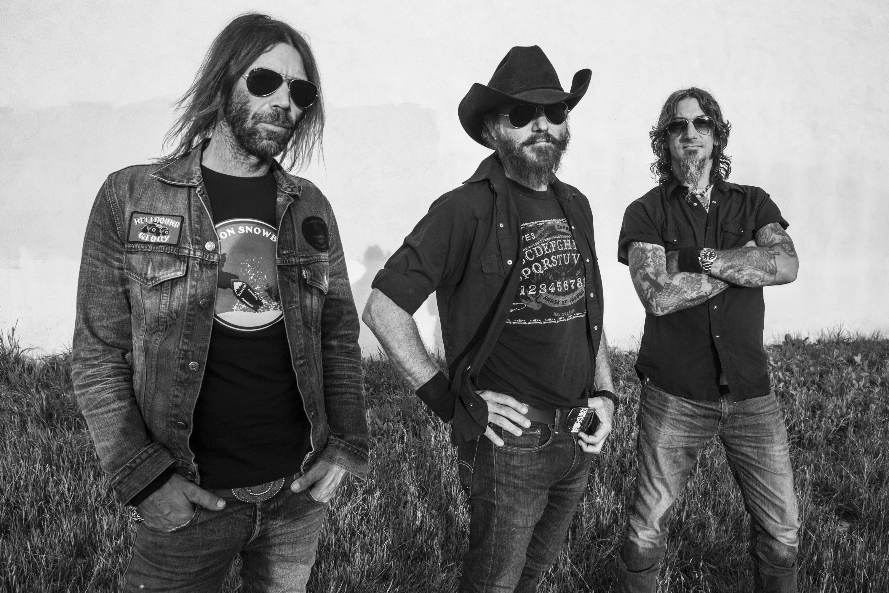 (EDITORS NOTE: Image has been converted to black and white.) ROSEMEAD, CA - MARCH 24: Chris VonStreicher, Marty Chandler and Eddie Spaghetti of the band Supersuckers pose for a portrait at Spike's Bar & Billiards on March 24, 2017 in Rosemead, California. (Photo by Harmony Gerber/Getty Images) *** Local Caption *** Chris VonStreicher; Marty Chandler; Eddie Spaghetti